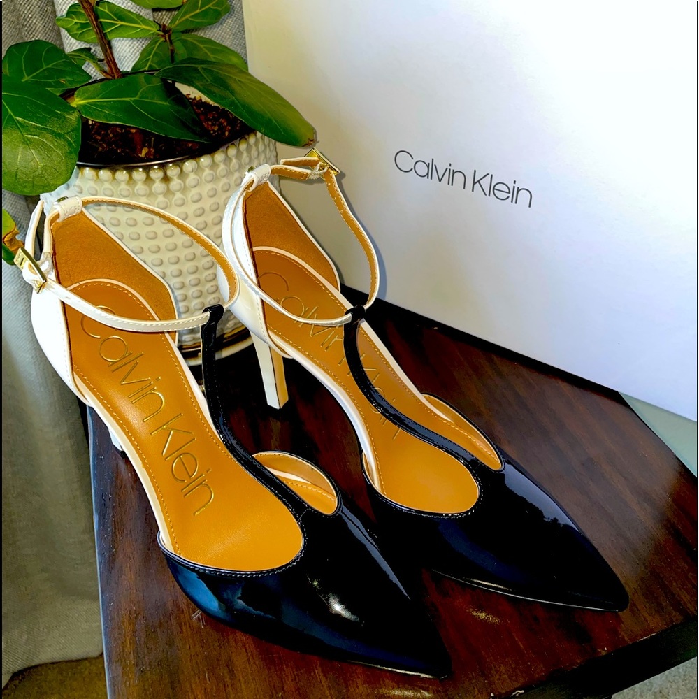 Calling Klein t-strap patent leather heels.